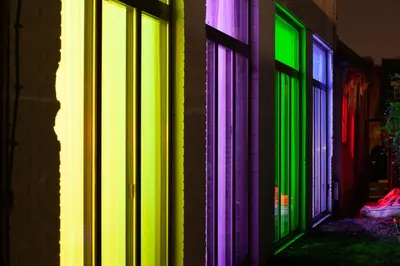 a group of windows with green and colorful lights at Valerius Boutique Hotel in Wormer