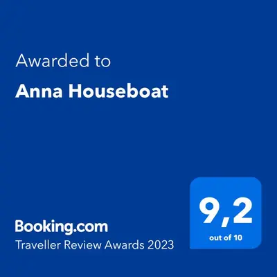 a screenshot of an amana houseboat with the text awarded to amana house at Anna Houseboat in Amsterdam