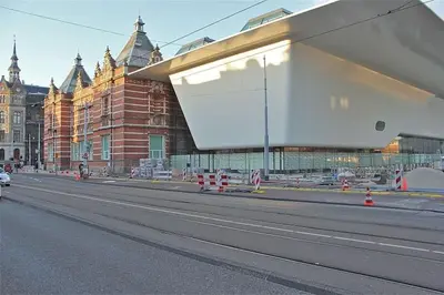 a large white building on the side of a street at The Little Townhouse in Amsterdam