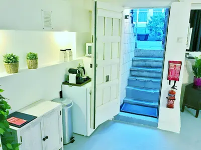 a room with a staircase with blue steps at Amsterdam Home in Amsterdam