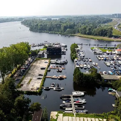 an aerial view of a marina with boats in the water at Motor Yacht Amstelle in Amsterdam