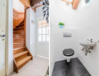 a bathroom with a toilet and a sink at Het Schaager Waapen in Alkmaar