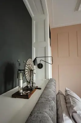a table with a fan on top of a couch at MUZE Hotel Utrecht in Utrecht