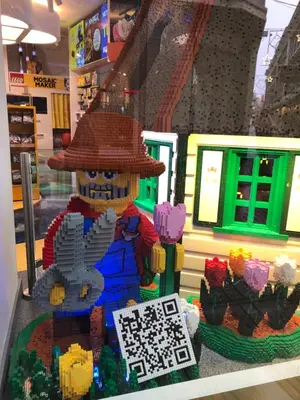 a lego man in a straw hat in a store at KG House in Amsterdam