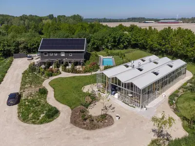 an overhead view of a building with a garden at Onze Kas in Lelystad