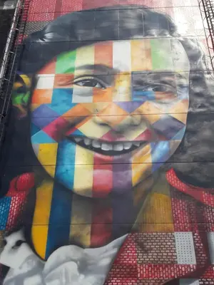 a painting of a face on a table at B & B Tulp Amsterdam Noord in Amsterdam