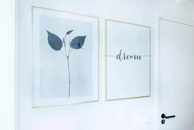 three framed prints of a flower on a wall at Trendy 2 bedroom accommodation on perfect location in Amsterdam