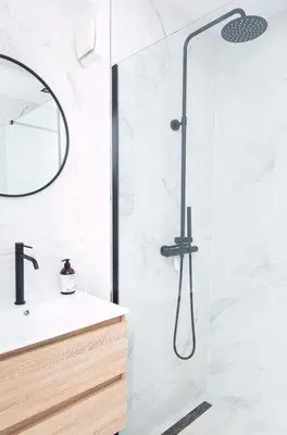 a bathroom with a shower with a sink and a mirror at Trendy 2 bedroom accommodation on perfect location in Amsterdam
