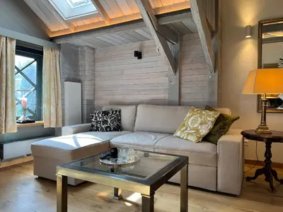 a living room with a couch and a table at Pakasa in Leiden