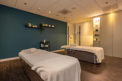 a hospital room with two beds in a room at Fletcher Wellness-Hotel Leiden in Leiden