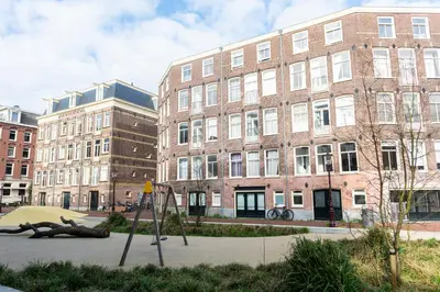 a group of buildings in front of a building at Canal View Apartment in Amsterdam