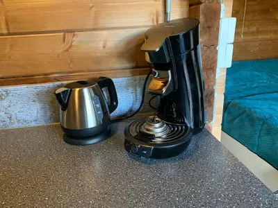 a coffee maker sitting on top of a counter at Chalet - B&B de Koog in Uitgeest