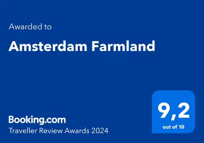 a blue rectangle with the words amazonandan farmandan at Amsterdam Farmland in Amsterdam