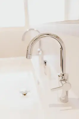 a kitchen sink with a silver faucet at Millsight in Uitgeest