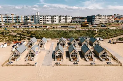 an aerial view of a row of houses on the beach at Thalassa Beach Houses in Zandvoort