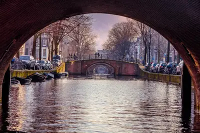 a bridge over a river in a city at Boutique Studio Magielsen in Amsterdam