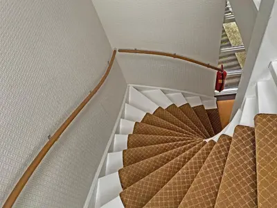 a spiral staircase in a building at Villa Prinsenhof # Tweeëntwintig in Bergen