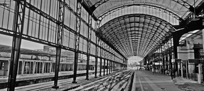 a black and white photo of a train station with two trains at Villa Prinsenhof # Vierendertig in Bergen