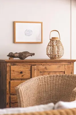 a table with a basket on top of a dresser at Schoorl Seasons Garden House 2026 in Schoorl