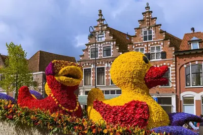 a group of stuffed teddy bears in a display of flowers at RiverSide Suite - Haarlem City Centre in Haarlem