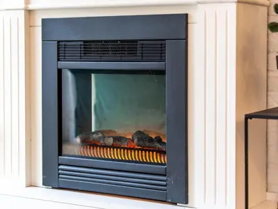 a fireplace with food cooking inside of it at Holiday Home in Noordwijkerhout near Lake in Noordwijkerhout