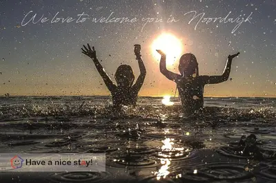 two girls in the water with a fire in their hands at Have a nice stay! - Vakantiehuis de Schelp op rustig park in Noordwijk
