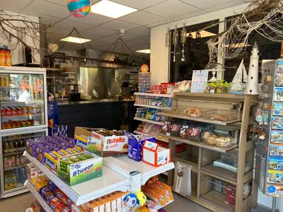 a store filled with lots of food on display at Luxe Chalet Marbella IJmuiden aan Zee in IJmuiden