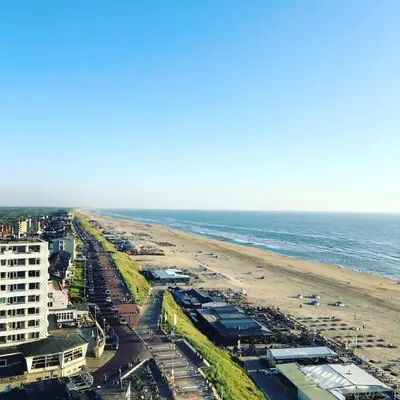 an aerial view of a beach and the ocean at Shell 61 in Zandvoort