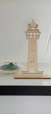 a model of a lighthouse on a table at 't Koerhaus in Egmond aan Zee