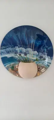 a plate with a vase on a ceiling at 't Koerhaus in Egmond aan Zee