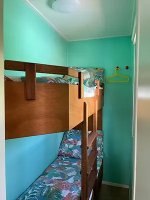 a bunk bed room with two bunk beds at Summer house on the Dutch coast in IJmuiden