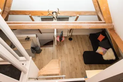 an overhead view of a living room in a loft at At the Butchers in Amsterdam