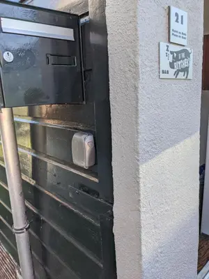 a door with a lock on the side of a building at At the Butchers in Amsterdam
