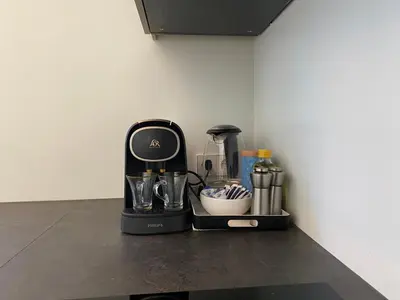a black coffee maker sitting on a counter at Beachhouse Wijk aan Zee 6 guests near beach free parking in Wijk aan Zee