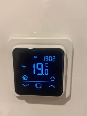 an electronic clock is shown on a white background at Luca’s Loft in Bergen