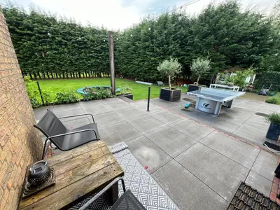an aerial view of a patio with a ping pong table at Paauwze in Rijnsburg