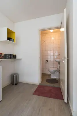 a bathroom with a toilet and a sink at RedLight District Private Smokers Friendly Studio in Amsterdam