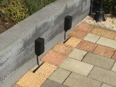 two speakers on the side of a wall at Herberg het Landhuis in Schoorl