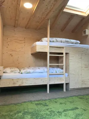 a bunk bed room with two bunk beds in a cabin at Guest House Amersfoort Center in Amersfoort