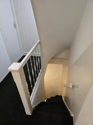 a stairway with a black and white staircase at Adam's loft in Amsterdam