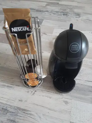 a coffee maker sitting next to a cart on the floor at Sunny Residence in Zandvoort