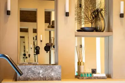 a bathroom counter with a sink and a mirror at The Clock Tower in Weesp