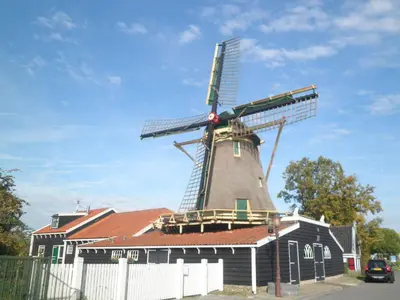 a windmill sitting on top of a building at B&B HutSpot in Amsterdam