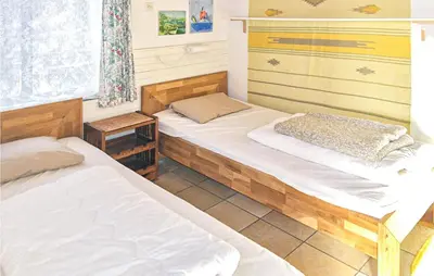 a room with two beds in a room at Pimpernel1 in Bergen aan Zee
