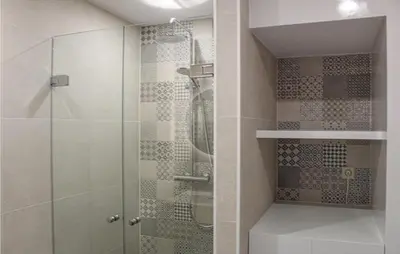 a shower with a glass door in a bathroom at The Blue Whale in Bergen aan Zee