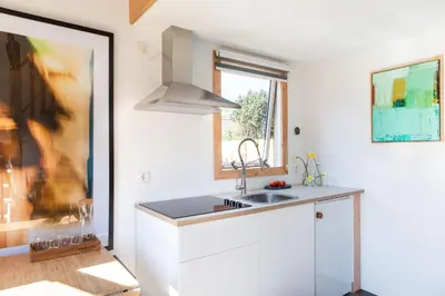 a kitchen with a sink and a window at Luna’s loft in Bergen