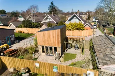 an aerial view of a house with a fence at Luna’s loft in Bergen