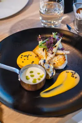a plate of food with eggs and a banana at DFDS Mini Cruise Amsterdam - Newcastle - Amsterdam in IJmuiden