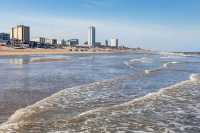 a view of the beach with buildings in the background at Zandvoort-17 in Zandvoort