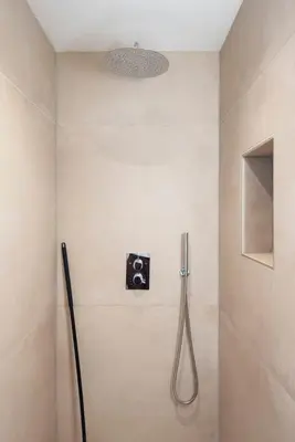 a shower in a bathroom with at Beach Studio Zen in the Centre of Zandvoort in Zandvoort